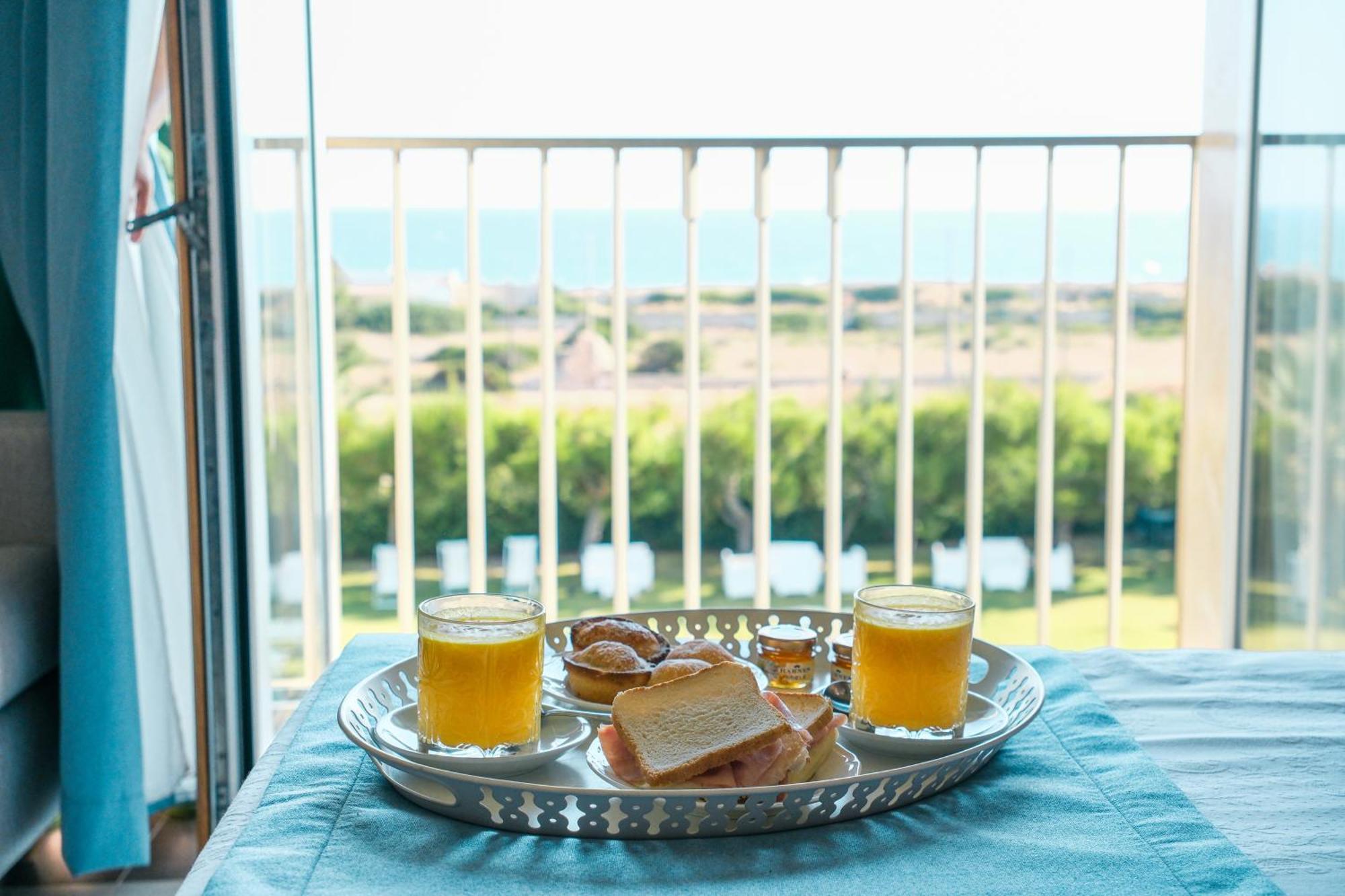 טורה סנטה סאבינה Hotel Scoglio Degli Achei מראה חיצוני תמונה